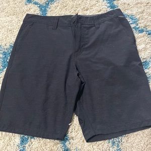 Black pin stripe volcom shorts. Slightly worn